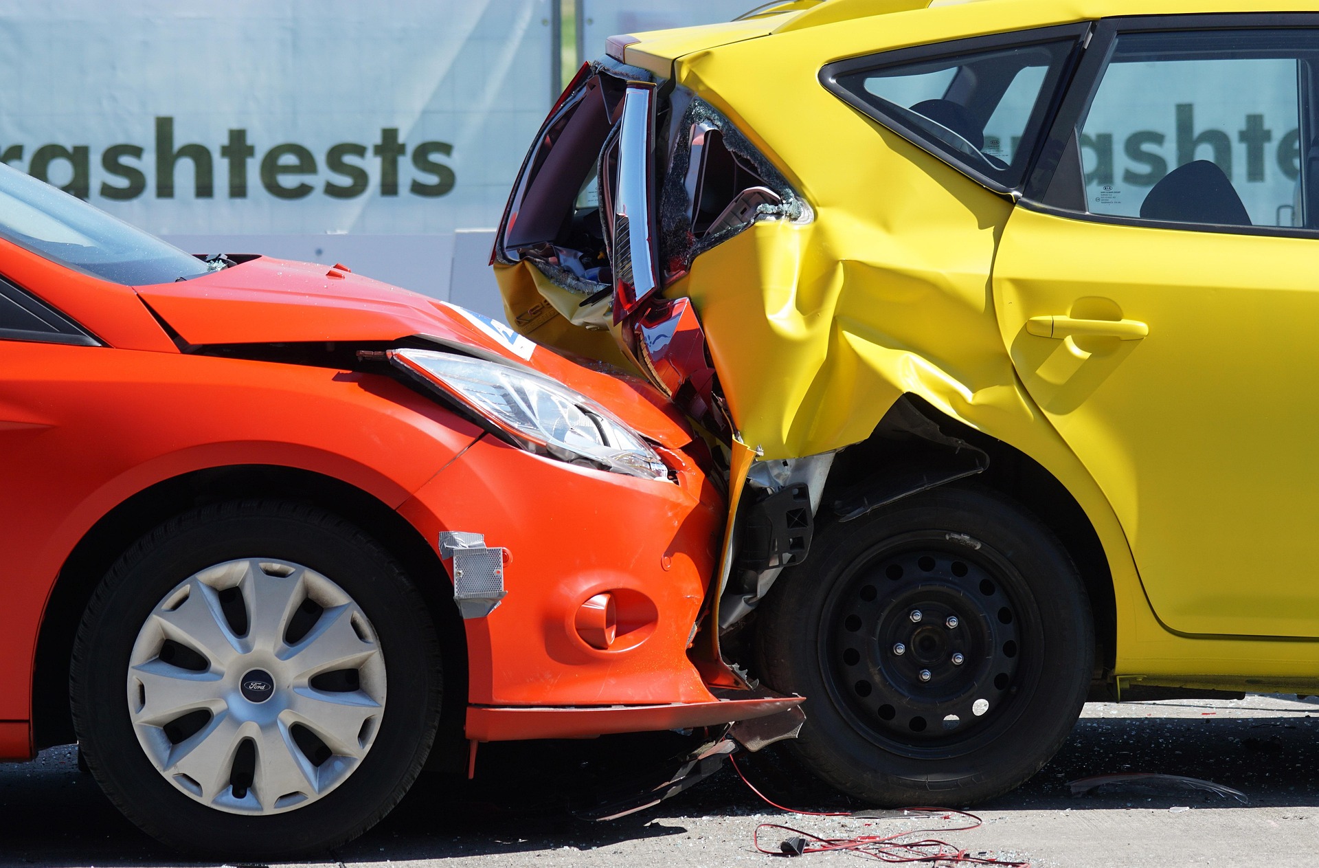 Multiple vehicles involved in a traffic accident with investigators and law enforcement at the scene